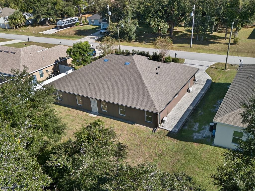 5637 Rhapsody Avenue North Port, FL 34288 - Photo 26 of 34 an aerial view of a house with swimming pool and patio