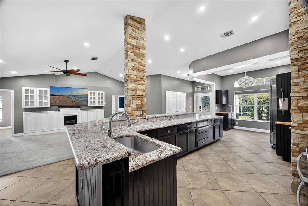 5637 Rhapsody Avenue North Port, FL 34288 - Photo 9 of 34 a kitchen with granite countertop lots of counter top space
