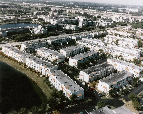an aerial view of a city with lots of residential buildings
