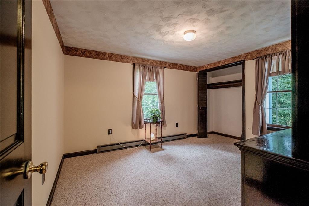 100 Sanborn Road Fryeburg, ME 04037 - Photo 17 of 35 Main level bedroom/den-office with...