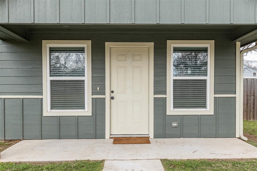 933 Rice Street Denison, TX 75020 - Photo 20 of 21 a front view of a house