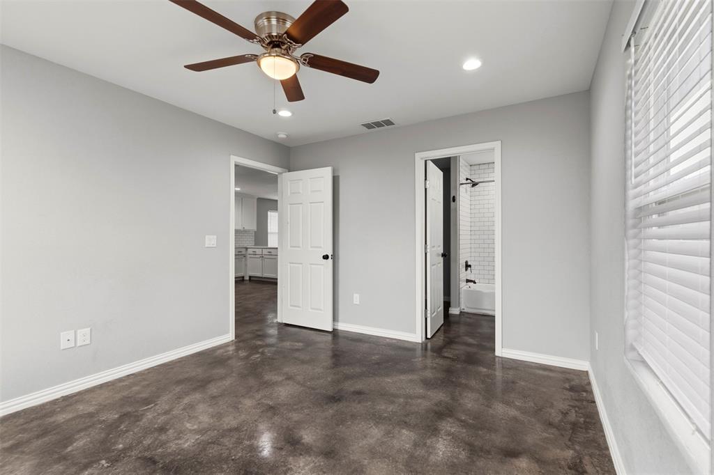 933 Rice Street Denison, TX 75020 - Photo 9 of 21 a view of an empty room and window
