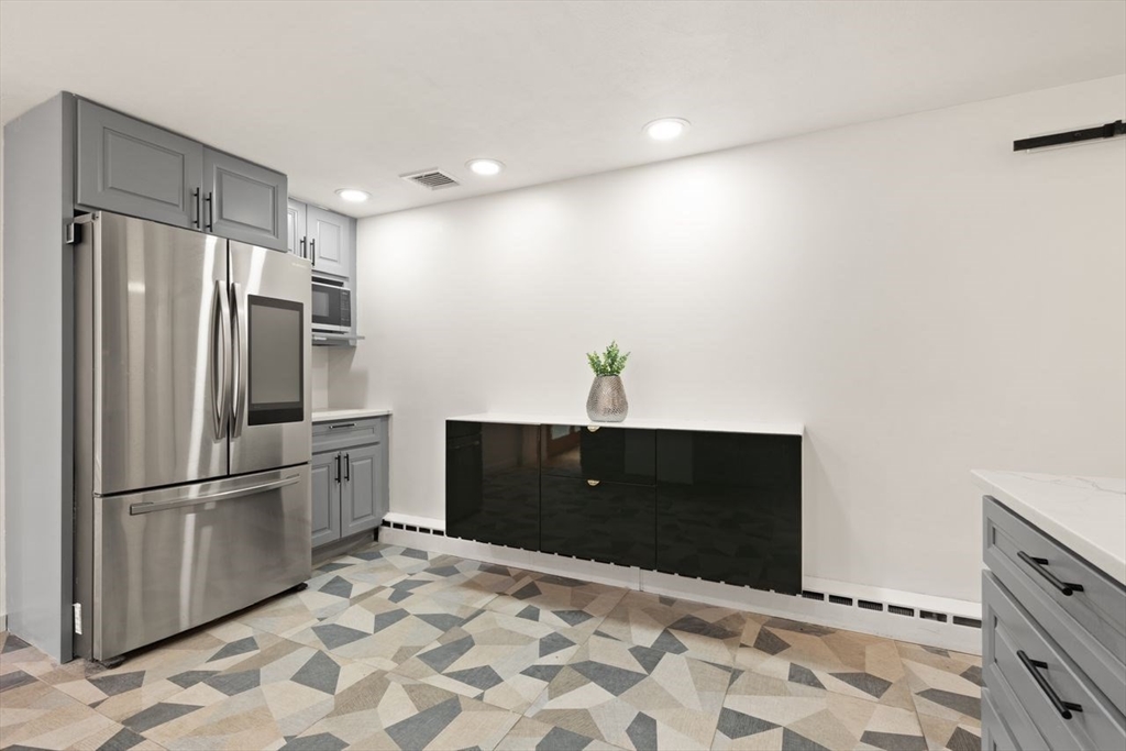 8 Margaret Road Sharon, MA 02067 - Photo 15 of 32 a kitchen with granite countertop a refrigerator and a sink