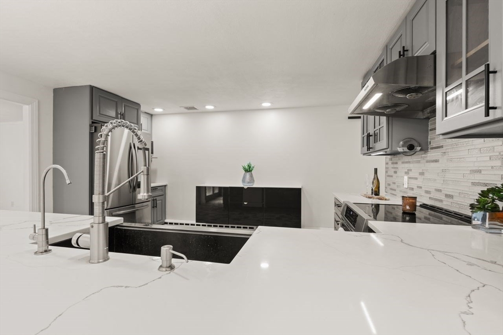 8 Margaret Road Sharon, MA 02067 - Photo 16 of 32 a bedroom with a bed and a sink