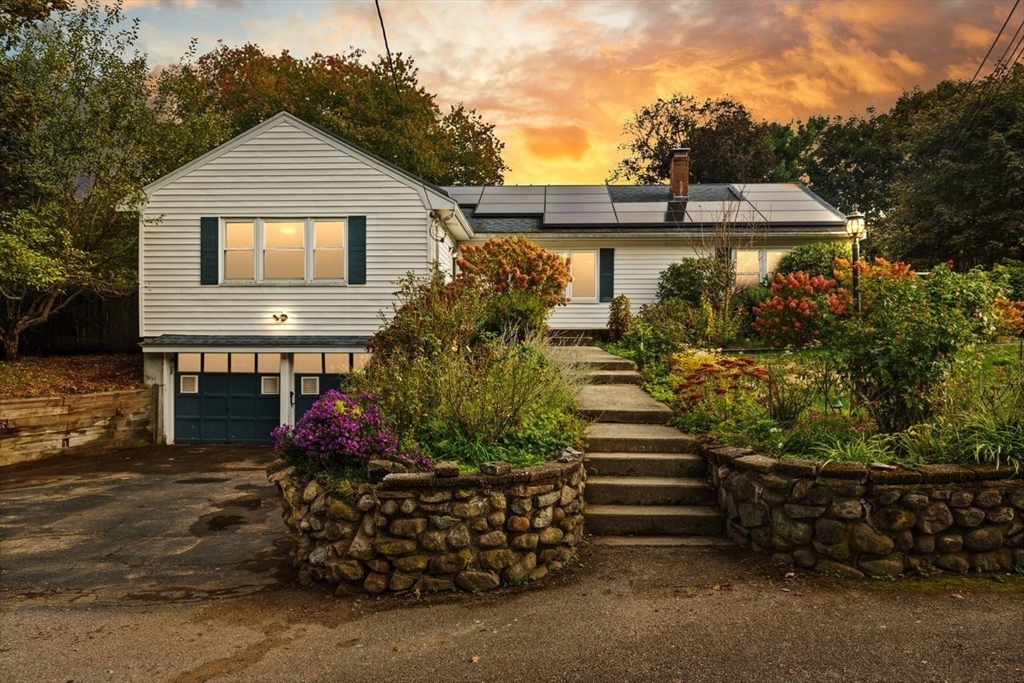 8 Margaret Road Sharon, MA 02067 - Photo 2 of 32 a front view of a house with a yard