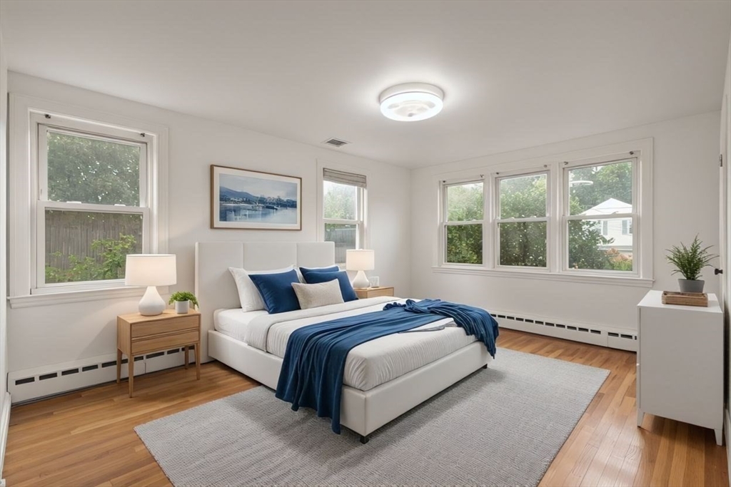 8 Margaret Road Sharon, MA 02067 - Photo 26 of 32 a bedroom with a large bed and a window