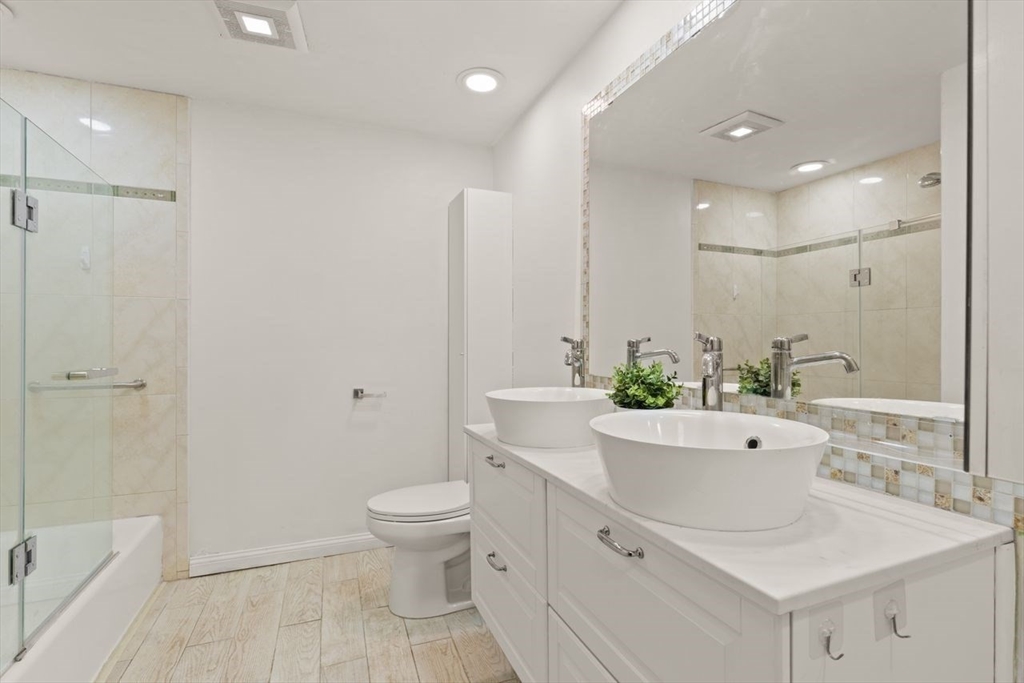 8 Margaret Road Sharon, MA 02067 - Photo 29 of 32 a bathroom with a sink a toilet and tub