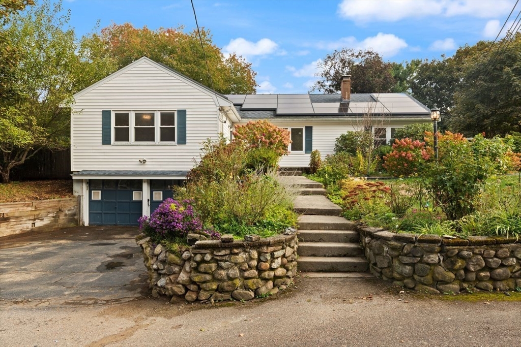 8 Margaret Road Sharon, MA 02067 - Photo 32 of 32 a front view of a house with a yard