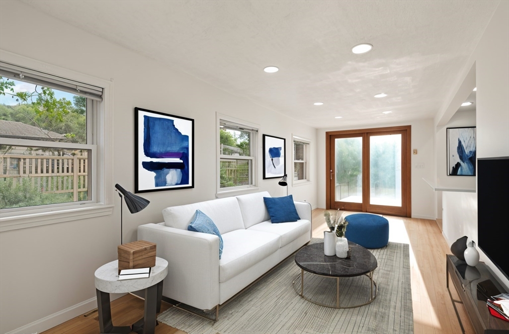 8 Margaret Road Sharon, MA 02067 - Photo 8 of 32 a living room with furniture and a flat screen tv