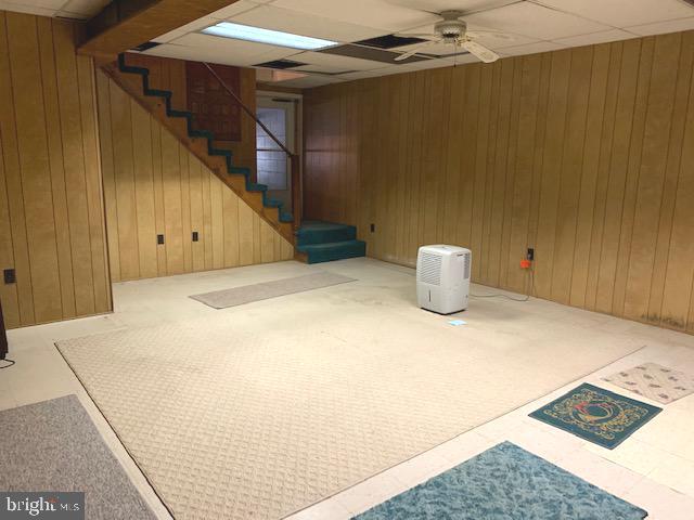 2578 Valley Road Berkeley Springs, WV 25411 - Photo 14 of 30 den looking towards the interior stairs and garage