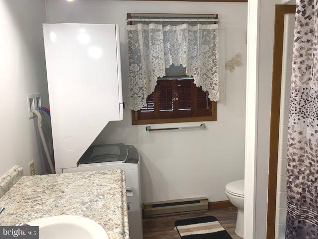 2578 Valley Road Berkeley Springs, WV 25411 - Photo 9 of 30 hallway bath complete with washer/dryer on main fl