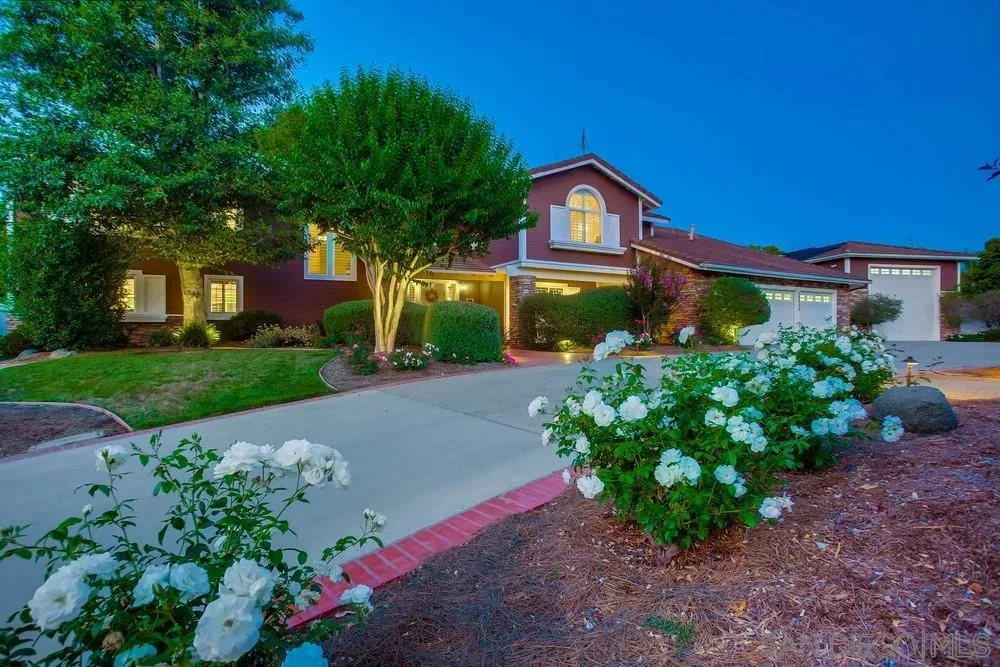 16255 Summer Sage Road Poway, CA 92064 - Photo 2 of 74 a front view of a house with a yard and fountain