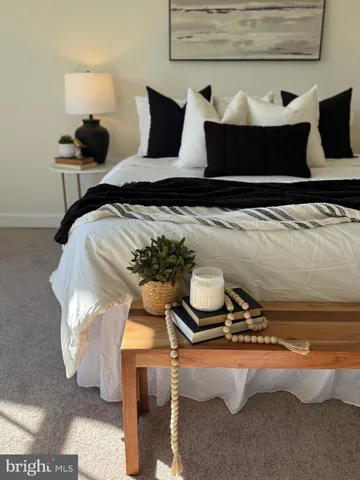 a table with a vase and flowers on it