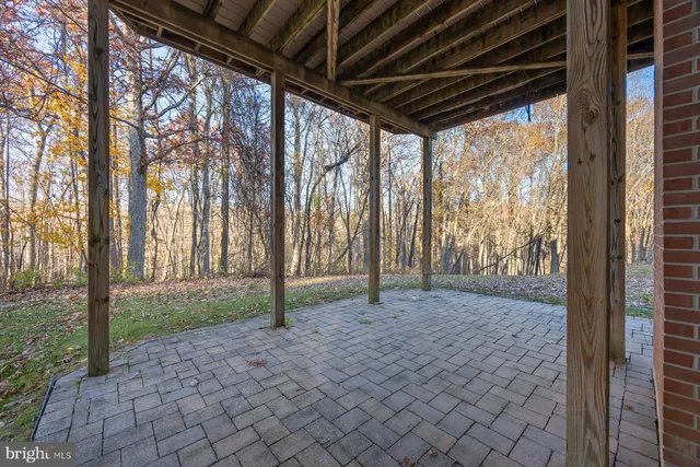 a view of empty room with trees