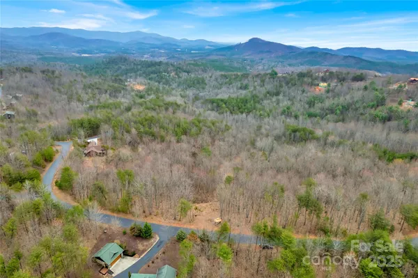 a view of mountain view with mountains in the background