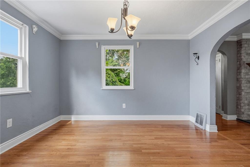 809 Franklin Road Mars, PA 16046 - Photo 14 of 44 Dining area with hardwood floors and abundant natural light
