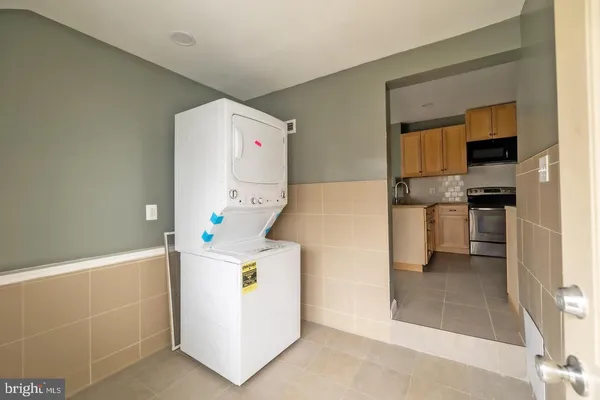 a utility room with washer and dryer