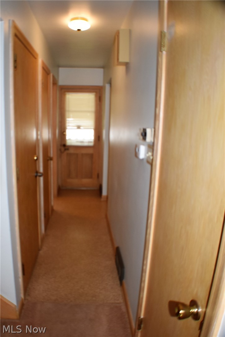 2155 Springfield Center Road Akron, OH 44312 - Photo 16 of 35 Pantry Closet, Storage Closet, Half bath, garage entry off back hallway