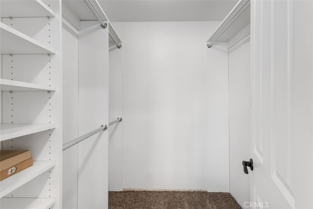 1741 Tustin Avenue, Unit 17C Costa Mesa, CA 92627 - Photo 24 of 36 a view of walk in closet