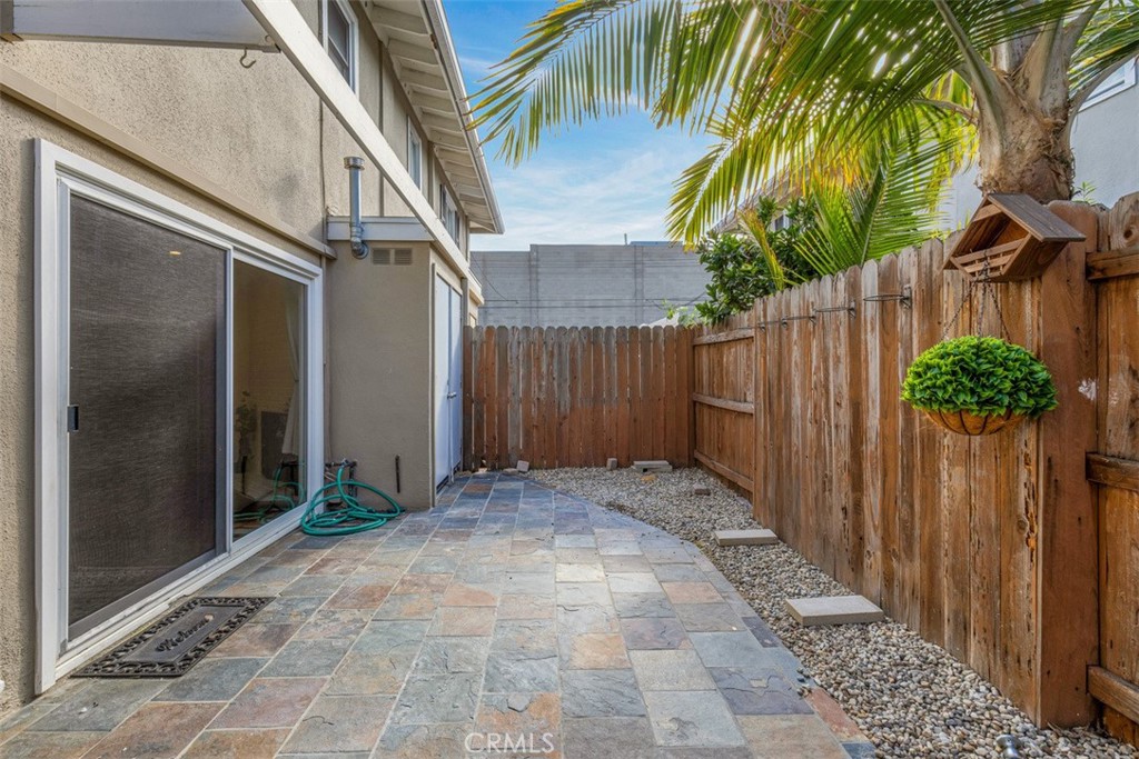 1741 Tustin Avenue, Unit 17C Costa Mesa, CA 92627 - Photo 26 of 36 a view of entryway with wooden floor