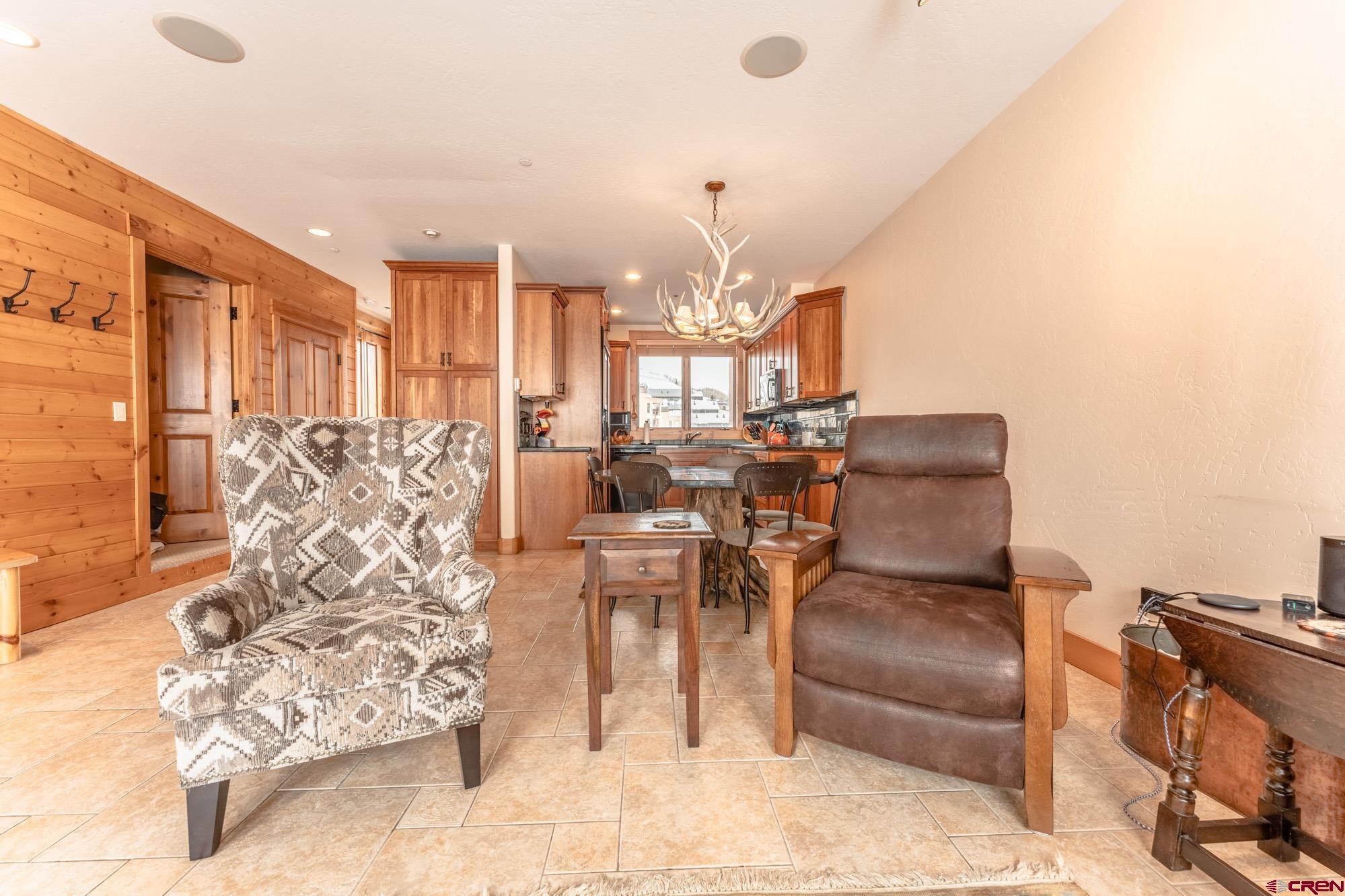 16 Snowmass Road, Unit 4 Crested Butte, CO 81225 - Photo 12 of 35 a very nice looking room with a large window
