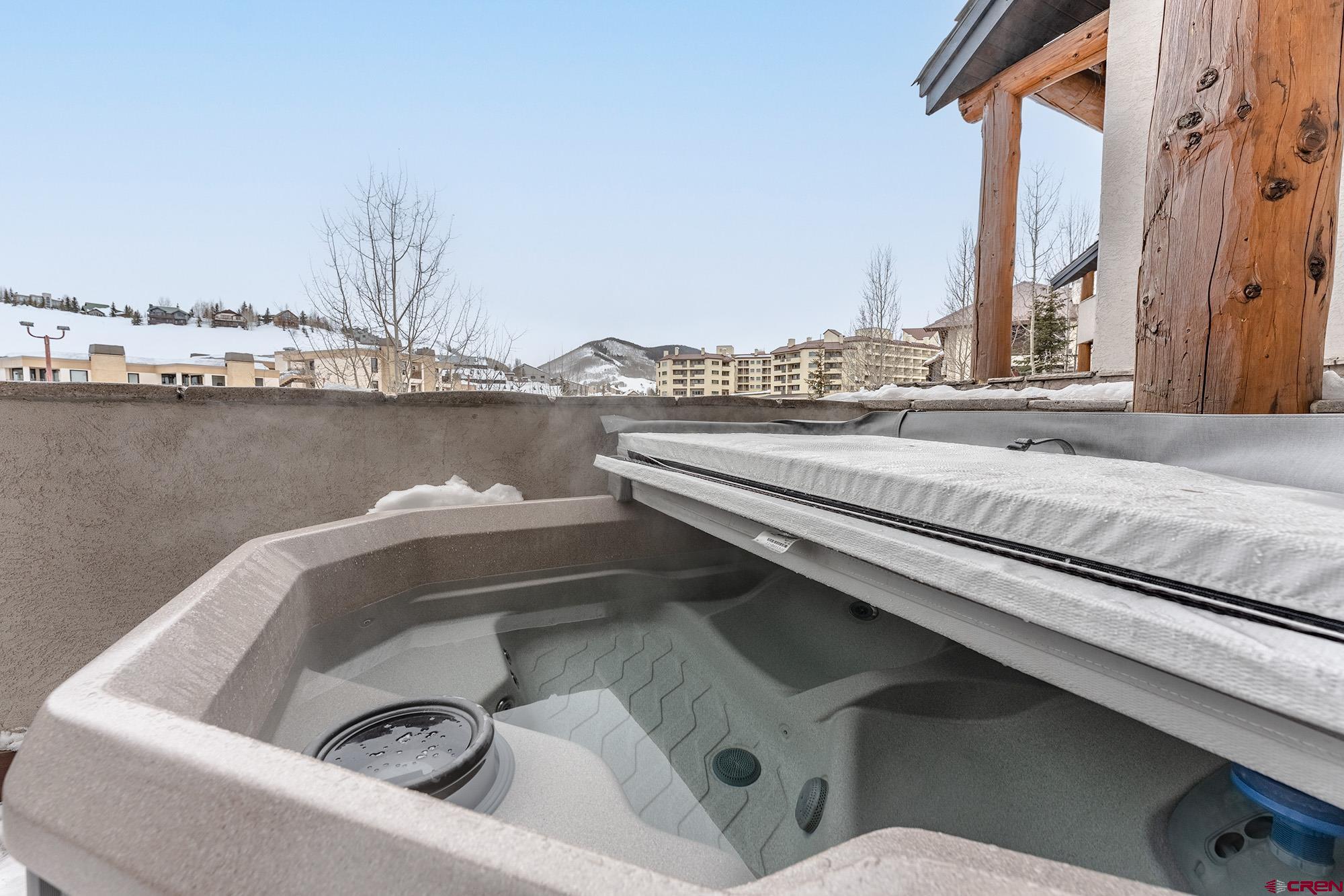 16 Snowmass Road, Unit 4 Crested Butte, CO 81225 - Photo 15 of 35 a view of roof with furniture and window