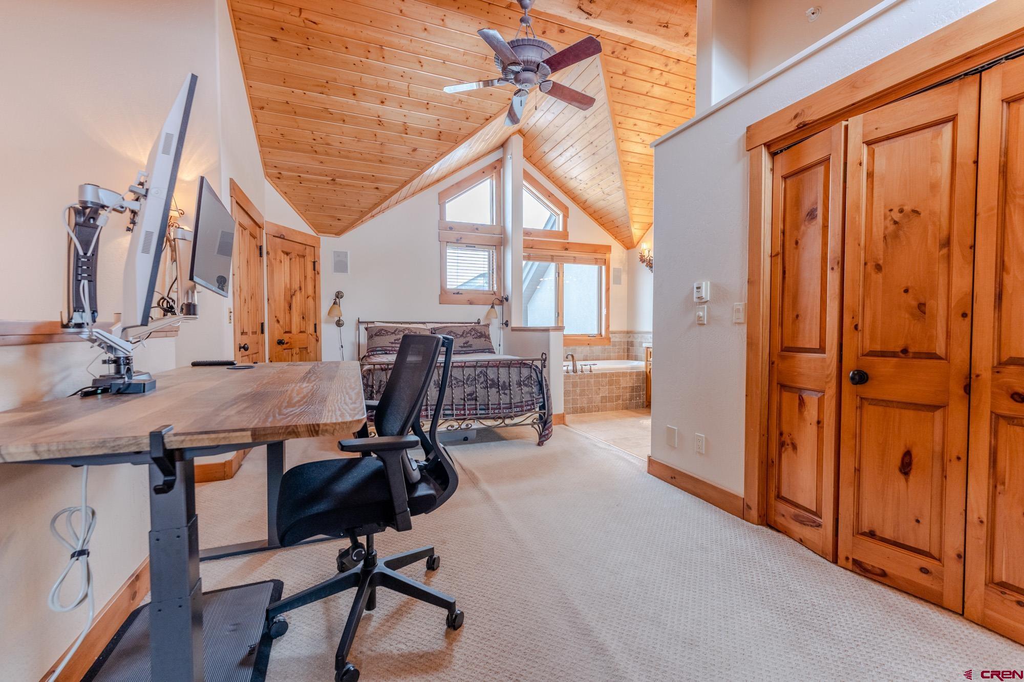 16 Snowmass Road, Unit 4 Crested Butte, CO 81225 - Photo 18 of 35 a view of a workspace with furniture and a window