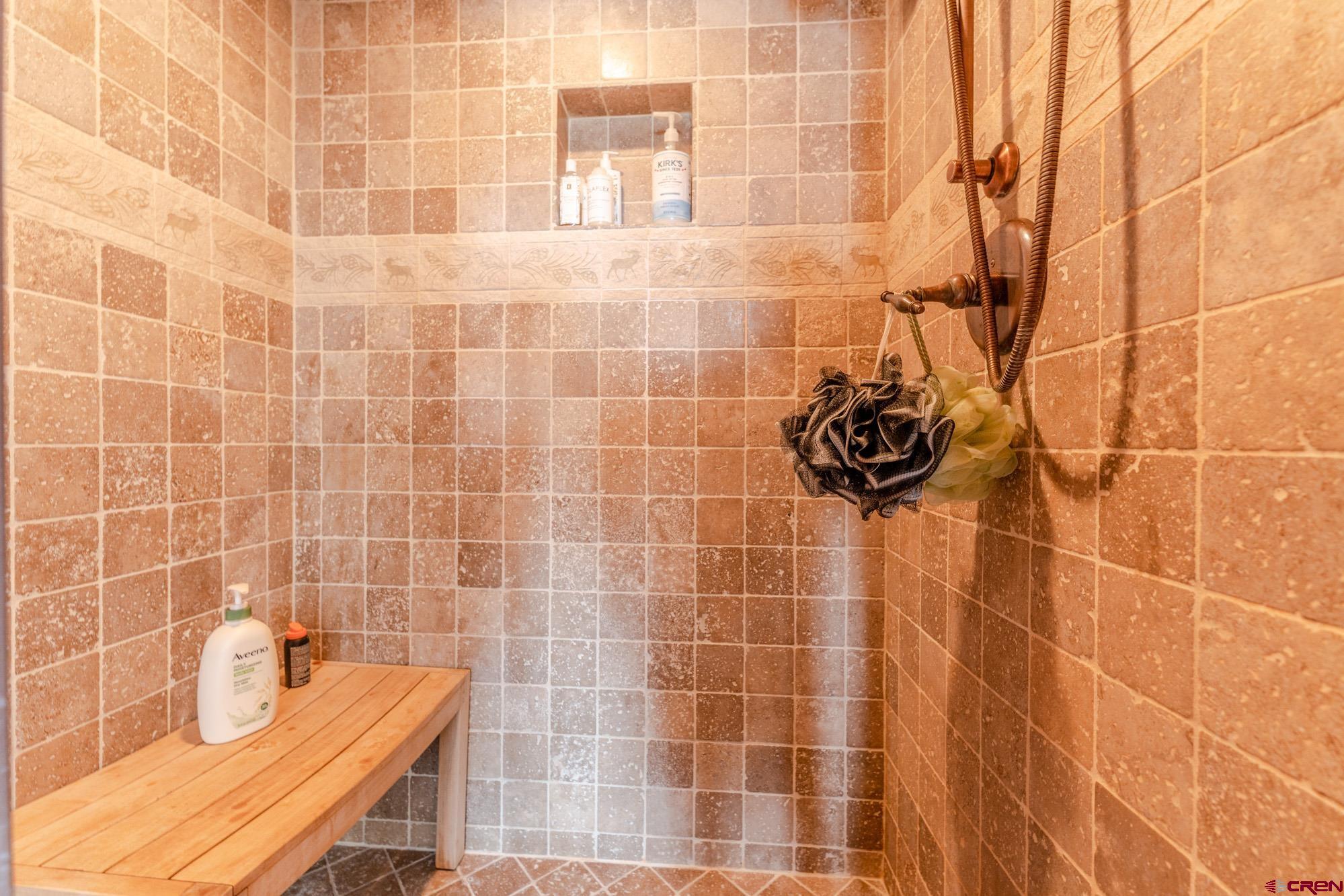 16 Snowmass Road, Unit 4 Crested Butte, CO 81225 - Photo 25 of 35 a bathroom with a sink and a shower