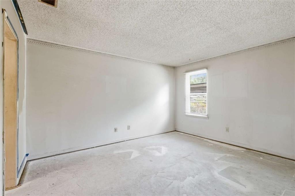 1980 Variations Drive Northeast Atlanta, GA 30329 - Photo 14 of 26 an empty room with a window