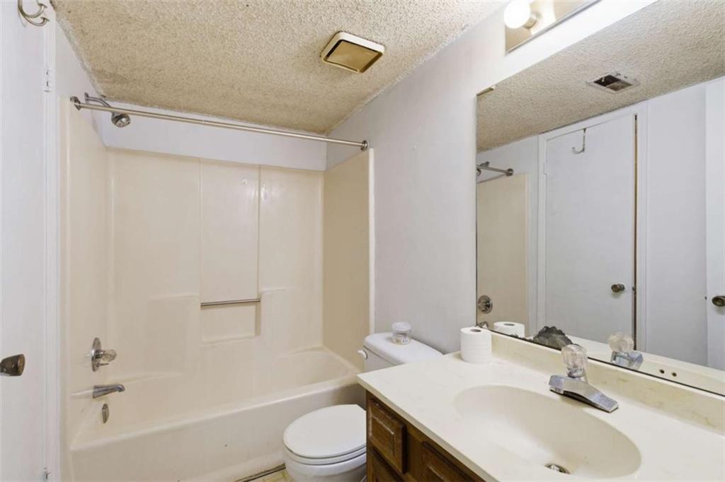 1980 Variations Drive Northeast Atlanta, GA 30329 - Photo 24 of 26 a bathroom with a sink toilet and shower