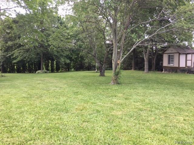 3874 Peters Road Columbiaville, MI 48421 - Photo 19 of 28 19 - Backyard with Coop.JPG