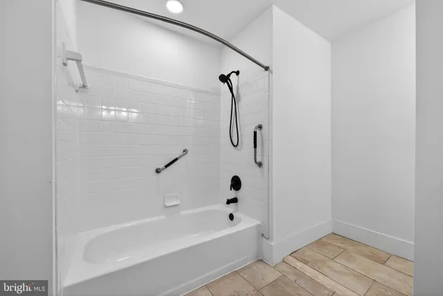 a bathroom with a bathtub