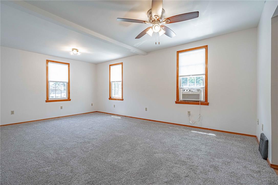 4165 East Texas Road Allentown, PA 18103 - Photo 32 of 56 A spacious room offers comfortable gray carpeting and natural light from multiple windows.