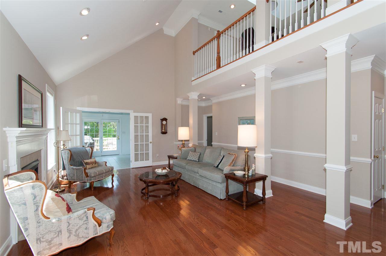 Move in ready. Freshly painted. Beautiful hardwood floors. Light bright and open
