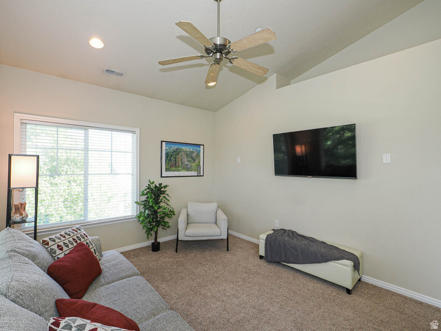 1138 Meadow Fork Road, Unit 7 Provo, UT 84606 - Photo 7 of 27 Living area featuring vaulted ceilings with a ceiling fan, recessed lighting, and a large window with horizontal blinds