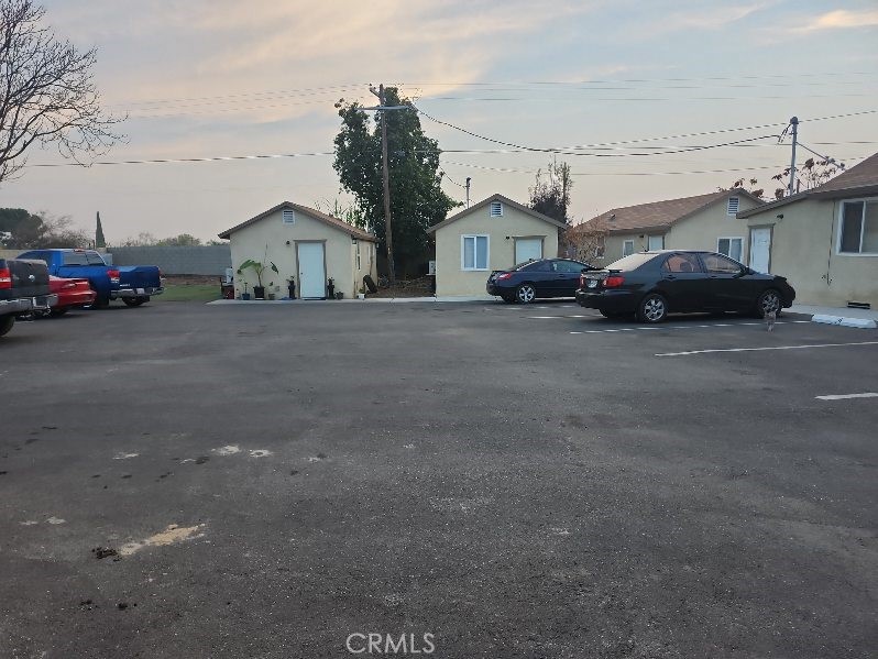 2915 Edison Highway Bakersfield, CA 93307 - Photo 18 of 21 a view of a car park in front of house