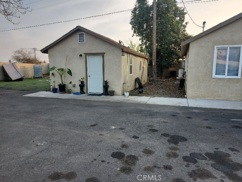 2915 Edison Highway Bakersfield, CA 93307 - Photo 19 of 21 a view of a house with a patio