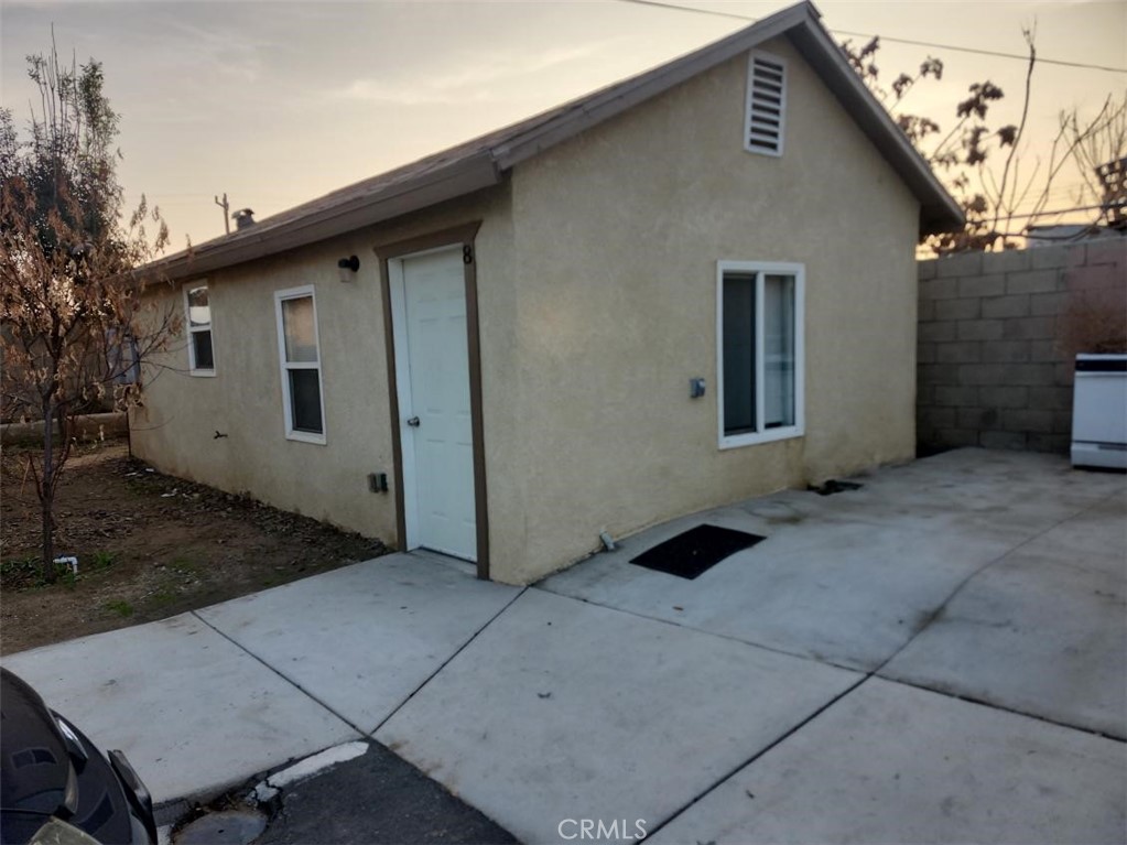 2915 Edison Highway Bakersfield, CA 93307 - Photo 8 of 21 a backyard of a house with shaded area