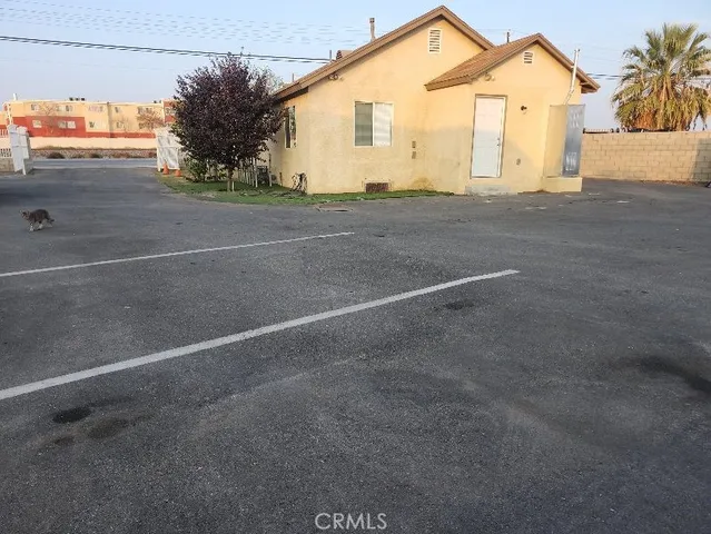 a view of a house with a street