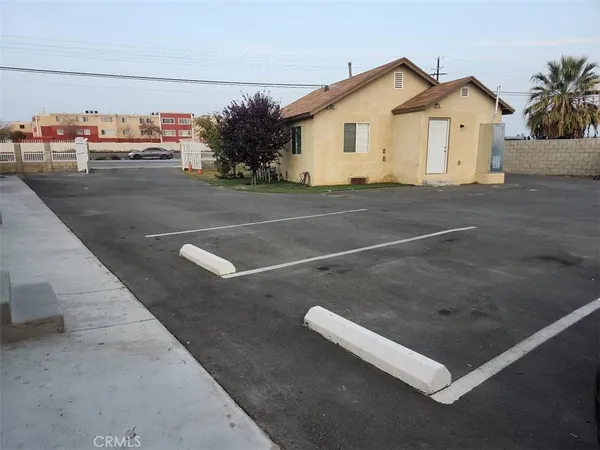 a view of a house with a street