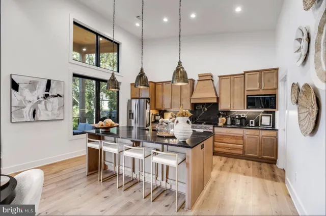 a spacious bedroom with a bed and a window