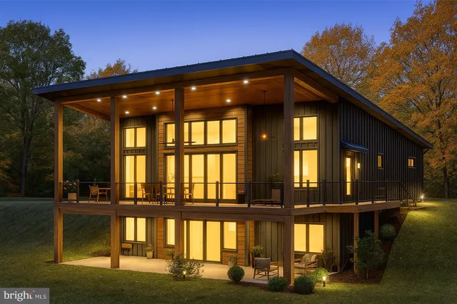 a view of a lake with a yard