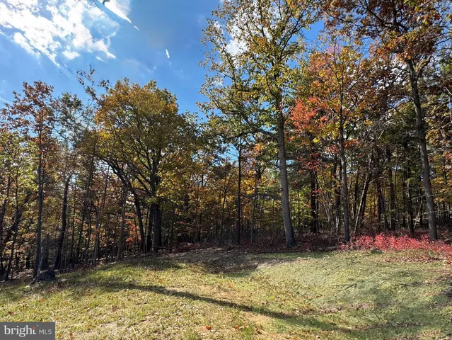 a view of an house with backyard porch and entertaining space