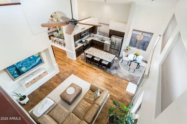 a view of living room with furniture and a table