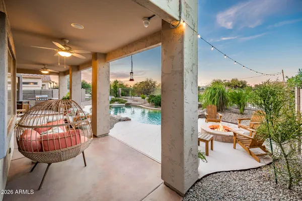 a outdoor space with patio furniture and potted plants