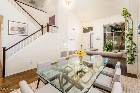 a living room with furniture and a table