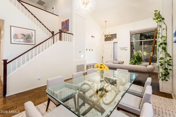 a living room with furniture and a table