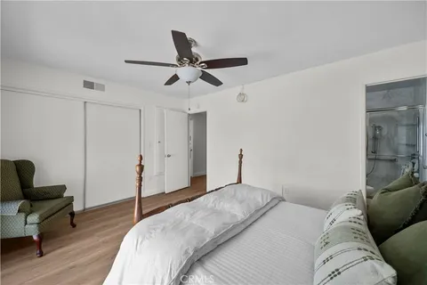 a bedroom with a bed and furniture
