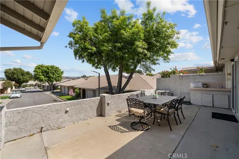 an aerial view of a house with outdoor space