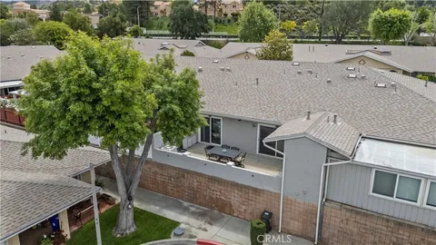 aerial view of a house with potted plants